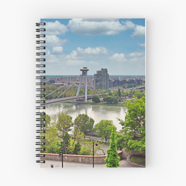 Item preview, Aerial view of the Bratislava cityscape with a famous UFO tower observation deck above SNP bridge over Danube river. Bratislava is a capital city of Slovakia. designed and sold by goceris.