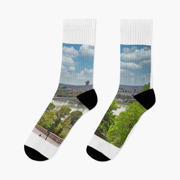 Item preview, Aerial view of the Bratislava cityscape with a famous UFO tower observation deck above SNP bridge over Danube river. Bratislava is a capital city of Slovakia. designed and sold by goceris.