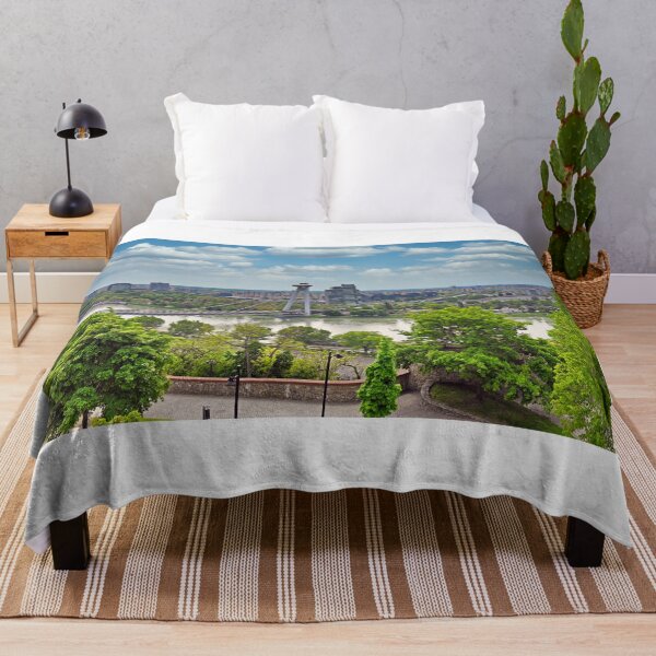 Item preview, Aerial view of the Bratislava cityscape with a famous UFO tower observation deck above SNP bridge over Danube river. Bratislava is a capital city of Slovakia. designed and sold by goceris.