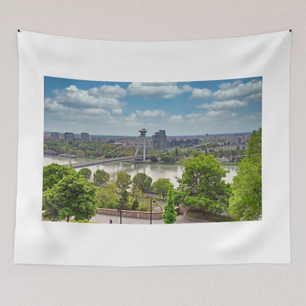 Item preview, Aerial view of the Bratislava cityscape with a famous UFO tower observation deck above SNP bridge over Danube river. Bratislava is a capital city of Slovakia. designed and sold by goceris.
