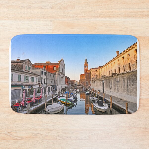 Item preview, Church of Saint James Apostle, canal Vena nestled in town of Chioggia, Venetian Lagoon, Veneto, Italy. Small boats floating in calm water  designed and sold by goceris.