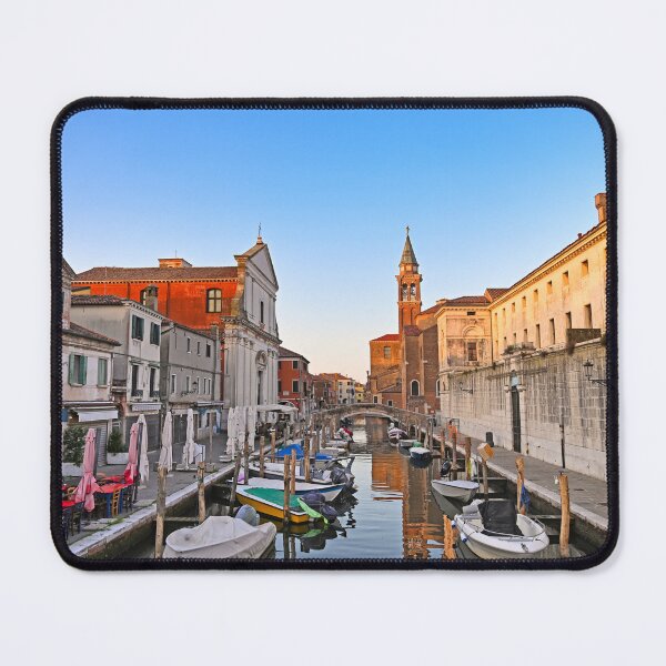 Item preview, Church of Saint James Apostle, canal Vena nestled in town of Chioggia, Venetian Lagoon, Veneto, Italy. Small boats floating in calm water  designed and sold by goceris.
