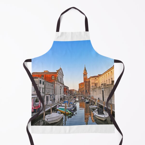 Item preview, Church of Saint James Apostle, canal Vena nestled in town of Chioggia, Venetian Lagoon, Veneto, Italy. Small boats floating in calm water  designed and sold by goceris.