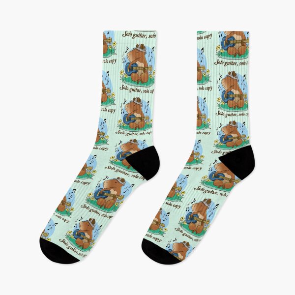 Item preview, A capybara playing guitar in nature designed and sold by Konopikyu.