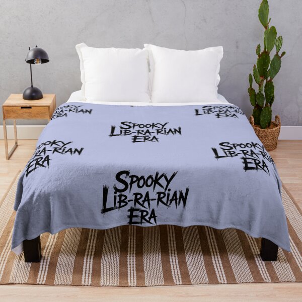 Item preview, Spooky Librarian Era Halloween Book Lover T-Shirt designed and sold by Raw Tigers.