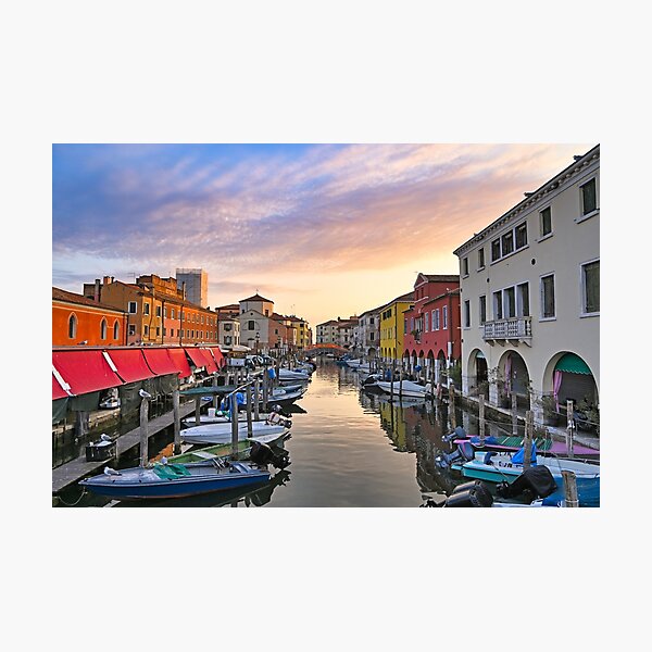 Item preview, Small boats floating in calm water, sunrise over town of Chioggia, Venetian Lagoon, Veneto, Italy.  designed and sold by goceris.