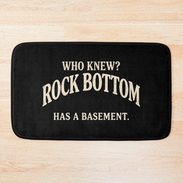 Item preview, Who Knew Rock Bottom Has A Basement Sarcastic Retro Graphic Slogan designed and sold by Go Easy Apparel.