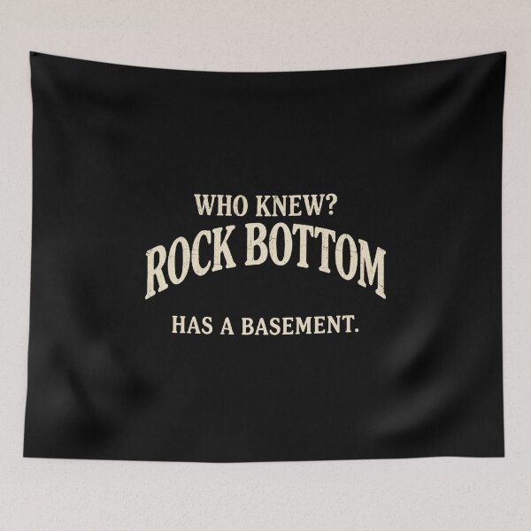 Item preview, Who Knew Rock Bottom Has A Basement Sarcastic Retro Graphic Slogan designed and sold by Go Easy Apparel.
