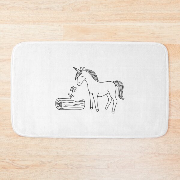 Item preview, A unicorn sniffing a flower next to a log lying on the ground designed and sold by rasagamastore.