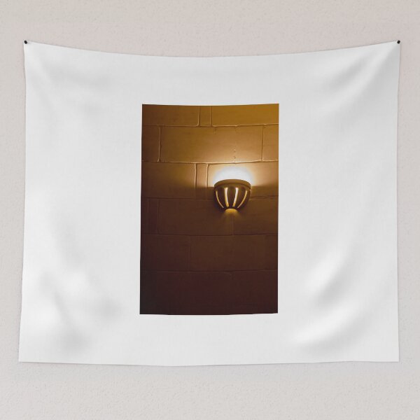Item preview, Warm Wall Sconce Light Casting Golden Glow On Tiled Brick Interior Wall For Cozy Ambience designed and sold by Nmallia.