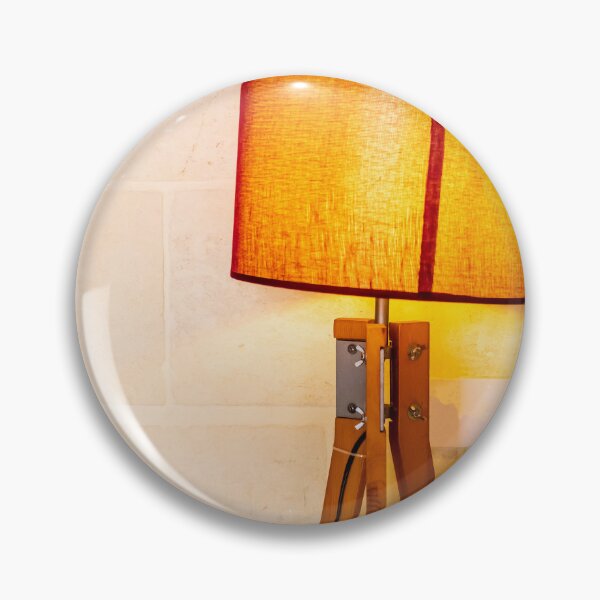 Item preview, Warm Wooden Tripod Floor Lamp With Orange Lampshade Against Stone Wall For Cozy Interior designed and sold by Nmallia.