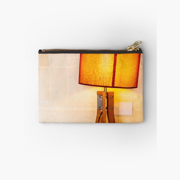 Item preview, Warm Wooden Tripod Floor Lamp With Orange Lampshade Against Stone Wall For Cozy Interior designed and sold by Nmallia.