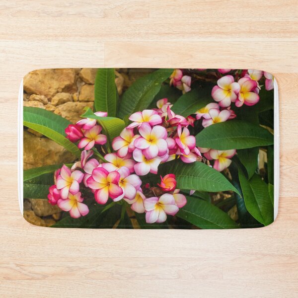 Item preview, Pink And White Plumeria (Frangipani) Blooms With Yellow Centers Against Tropical Green Leaves designed and sold by Nmallia.
