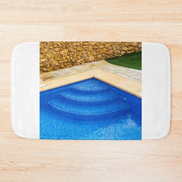 Item preview, Blue Mosaic Pool Steps Against Rustic Stone Wall With Patio and Lawn, Outdoor Relaxation designed and sold by Nmallia.