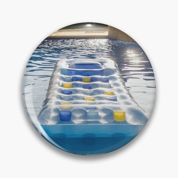 Item preview, Clear Inflatable Pool Float With Yellow And Blue Cup Holders Floating On Bright Blue Water designed and sold by Nmallia.