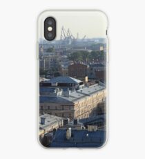 Building roofs cityscape scenery with cranes on the horizon. iPhone Case