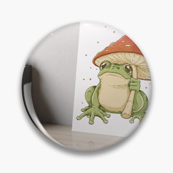 Artikelvorschau, Verspielter Frosch unter Pilz – Cottagecore-Kunstdruck entworfen und verkauft von VibeThreadsAura.