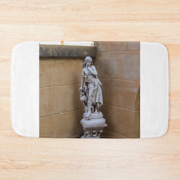 Item preview, Classical Marble Statue On Ornate Pedestal Against Stone Wall In Quiet Courtyard Nook designed and sold by Nmallia.