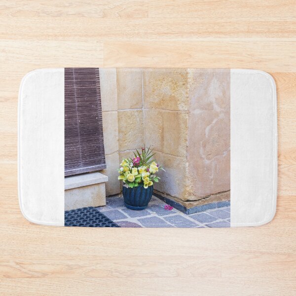 Item preview, Yellow Flower Pot In Stone Corner By Wooden Shutter On Mediterranean Paved Doorway designed and sold by Nmallia.