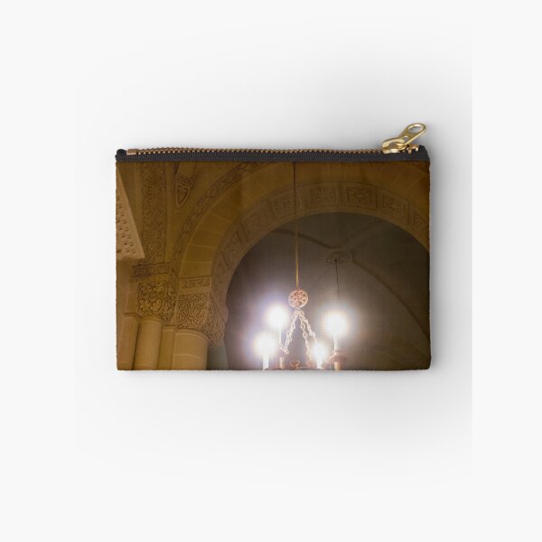 Item preview, Ornate Chandelier Hanging In Historic Stone Church Interior With Arches And Decorative Carvings designed and sold by Nmallia.