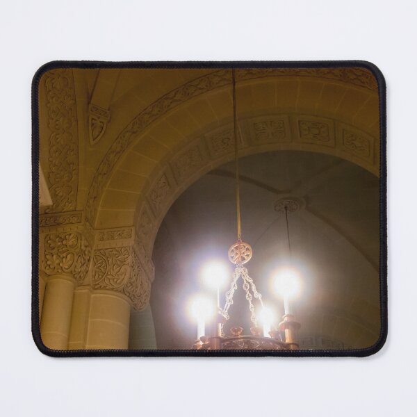 Item preview, Ornate Chandelier Hanging In Historic Stone Church Interior With Arches And Decorative Carvings designed and sold by Nmallia.