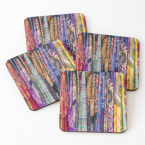 Item preview, Colorful Patterned Fabrics and Scarves Hanging in a Vibrant Textile Market Display designed and sold by Nmallia.