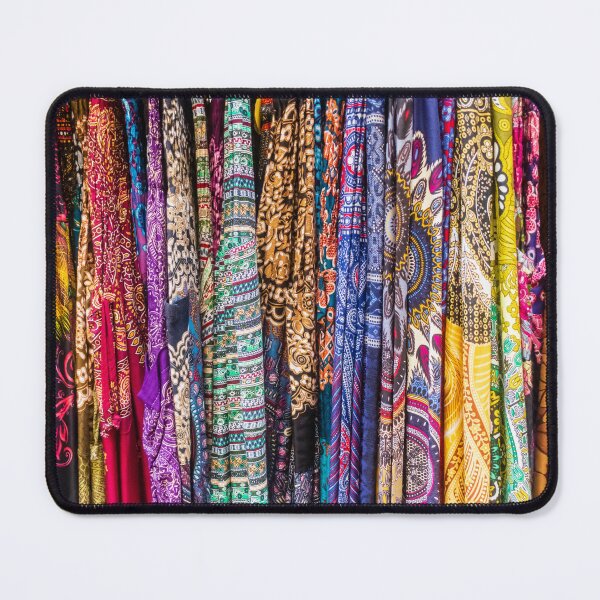 Item preview, Colorful Patterned Fabrics and Scarves Hanging in a Vibrant Textile Market Display designed and sold by Nmallia.