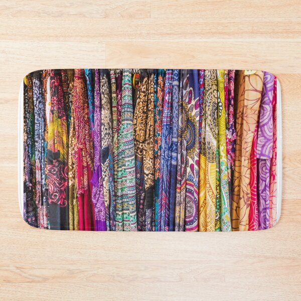 Item preview, Colorful Patterned Fabrics and Scarves Hanging in a Vibrant Textile Market Display designed and sold by Nmallia.
