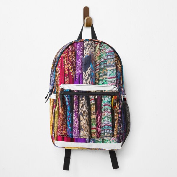 Item preview, Colorful Patterned Fabrics and Scarves Hanging in a Vibrant Textile Market Display designed and sold by Nmallia.
