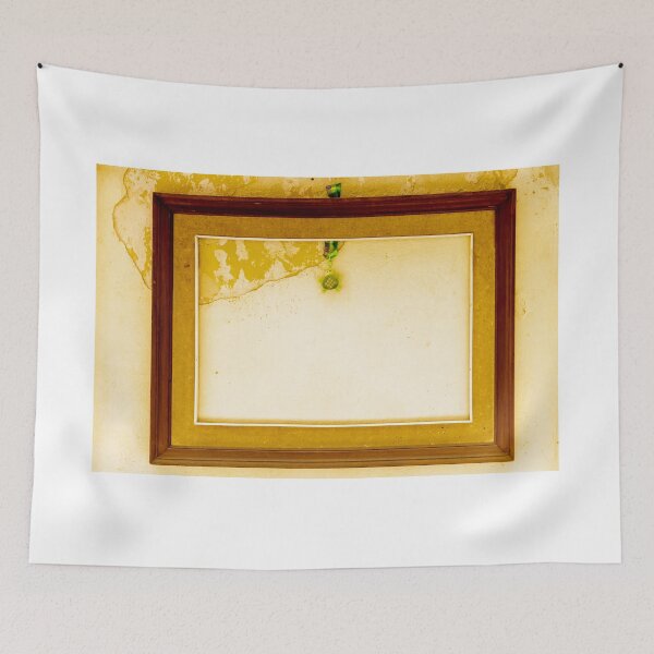 Item preview,  Empty Vintage Wooden Frame On Peeling Yellow Wall With Hanging Green Ornament And Blank Space designed and sold by Nmallia.