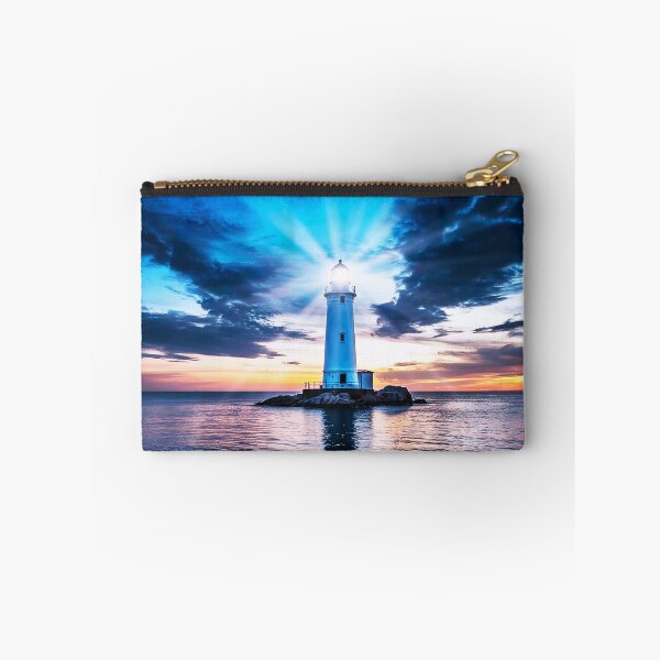 Item preview, Beacon of Hope – Lighthouse at Sunset designed and sold by Exodoi.
