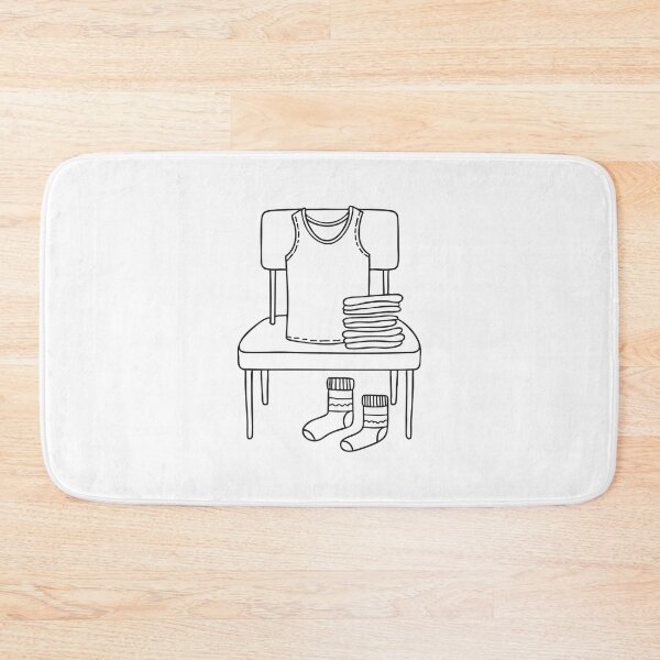 Item preview, A clean undershirt resting on a chair near folded socks designed and sold by rasagamastore.