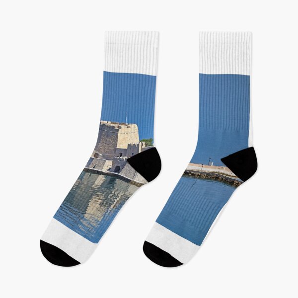 Item preview, Bourtzi water fortress is reflected in the water,  Nafplio, Peloponnese, Greece designed and sold by goceris.