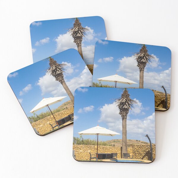 Item preview, Sunny Resort Pool With Palm Tree, Umbrella and Lounge Chairs Overlooking Stone Wall and Blue Sky designed and sold by Nmallia.
