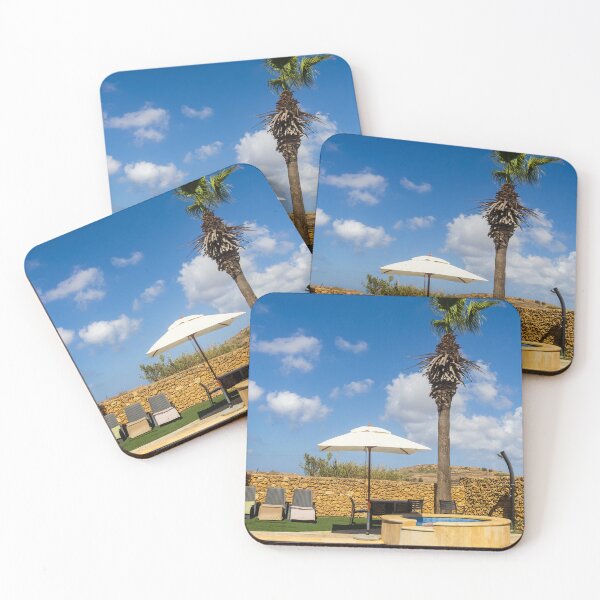 Item preview, Sunny Resort Pool With Palm Tree, Umbrella and Lounge Chairs Overlooking Stone Wall and Blue Sky designed and sold by Nmallia.