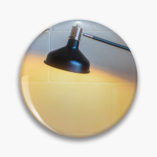 Item preview, Black Adjustable Desk Lamp Casting Warm Light on Textured Stone Wall in Cozy Interior designed and sold by Nmallia.