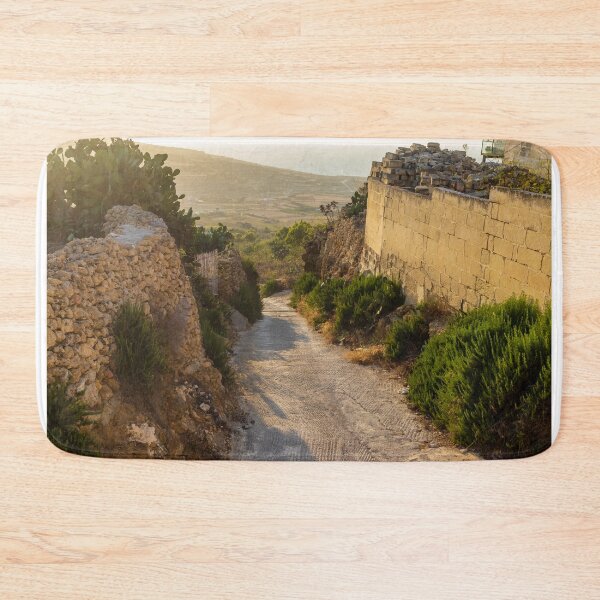 Item preview,  Sunlit Stone Path Through Rural Mediterranean Village Between Dry Stone Walls Overlooking Coast designed and sold by Nmallia.