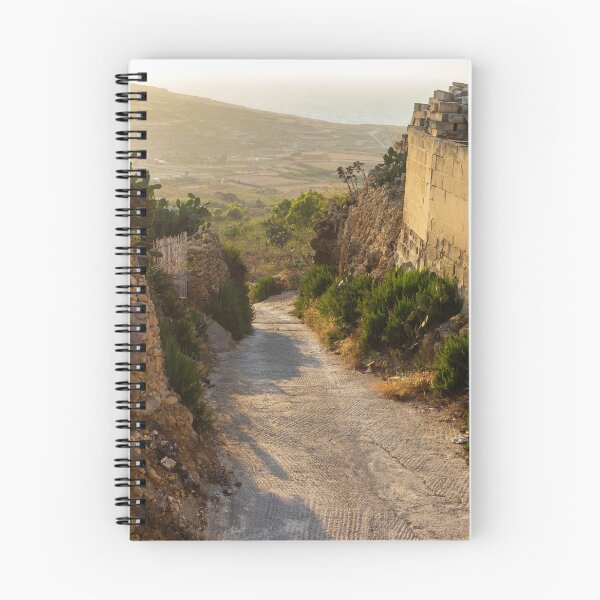 Item preview,  Sunlit Stone Path Through Rural Mediterranean Village Between Dry Stone Walls Overlooking Coast designed and sold by Nmallia.