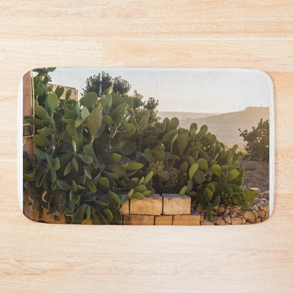 Item preview,  Prickly Pear Cactus Cluster On Stone Wall At Golden Sunset Over Rural Mediterranean Hills designed and sold by Nmallia.