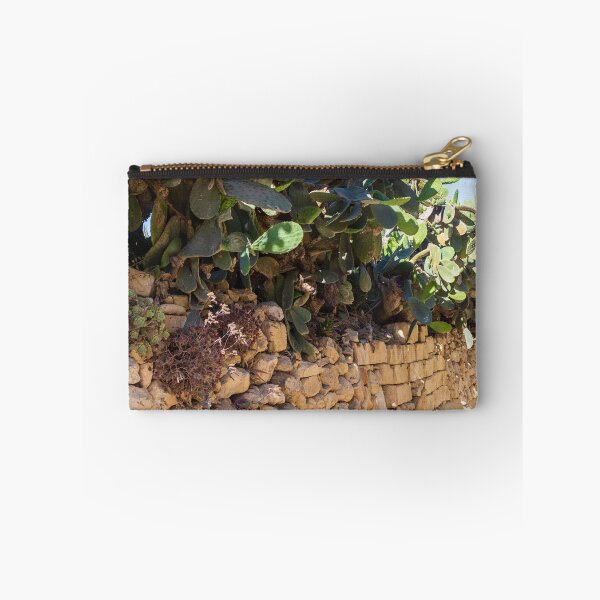 Item preview, Prickly Pear Cactus Cluster On Stone Wall At Golden Sunset Over Rural Mediterranean Hills designed and sold by Nmallia.