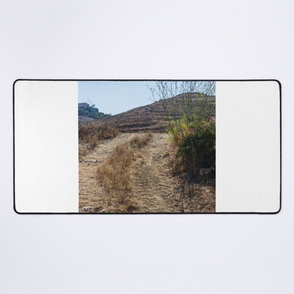 Item preview, Sunlit Stone Path Through Rural Mediterranean Village Between Dry Stone Walls Overlooking Coast designed and sold by Nmallia.