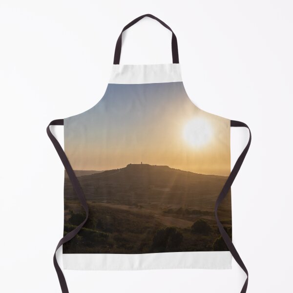 Item preview, Golden Sunset Over Rural Hill With Silhouetted Tower and Rolling Countryside in Warm Light designed and sold by Nmallia.