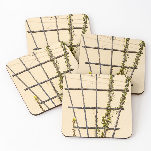 Item preview, Climbing Vines On Rustic Wooden Trellis Against Pale Yellow Garden Wall In Sunlight designed and sold by Nmallia.