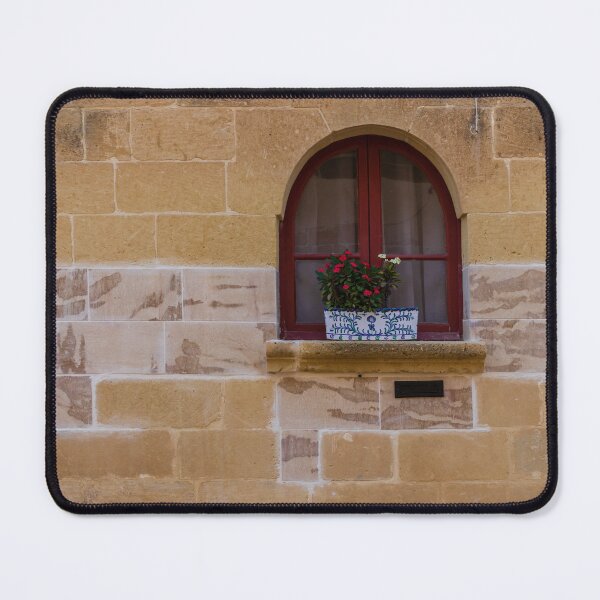 Item preview, Arched Red Window With Flower Planter on Sunlit Stone Wall in Rustic Mediterranean Street designed and sold by Nmallia.