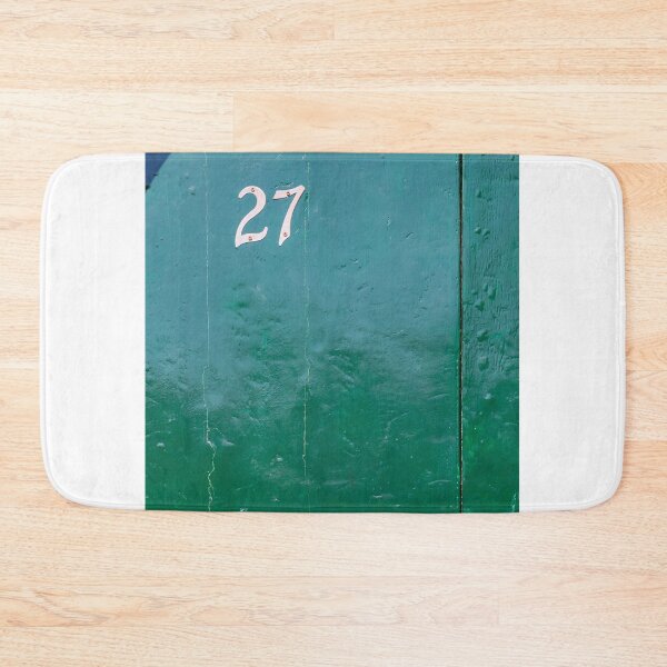 Item preview, Vintage Green Door With White Number 27 And Weathered Wood Texture In Sunlight designed and sold by Nmallia.