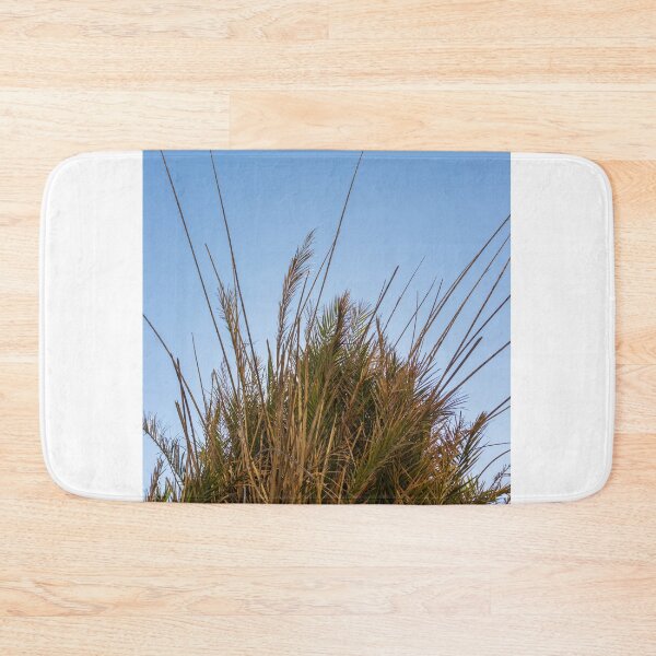 Item preview, Palm Tree Crown Against Clear Blue Sky With Dry Fronds and Tropical Foliage Detail designed and sold by Nmallia.