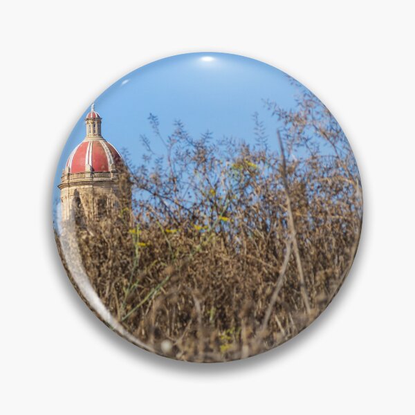 Item preview, Historic Cathedral Dome Peeking Above Dry Grass With Clear Blue Sky Background designed and sold by Nmallia.