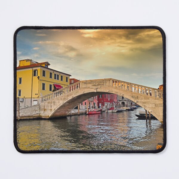 Item preview, Sunset sky over stone bridge Ponte di Vigo across Vena water canal, Chioggia town, Veneto Region, Italy designed and sold by goceris.