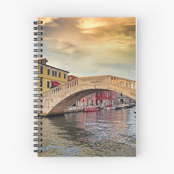 Item preview, Sunset sky over stone bridge Ponte di Vigo across Vena water canal, Chioggia town, Veneto Region, Italy designed and sold by goceris.