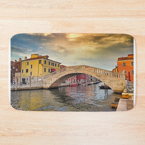 Item preview, Sunset sky over stone bridge Ponte di Vigo across Vena water canal, Chioggia town, Veneto Region, Italy designed and sold by goceris.